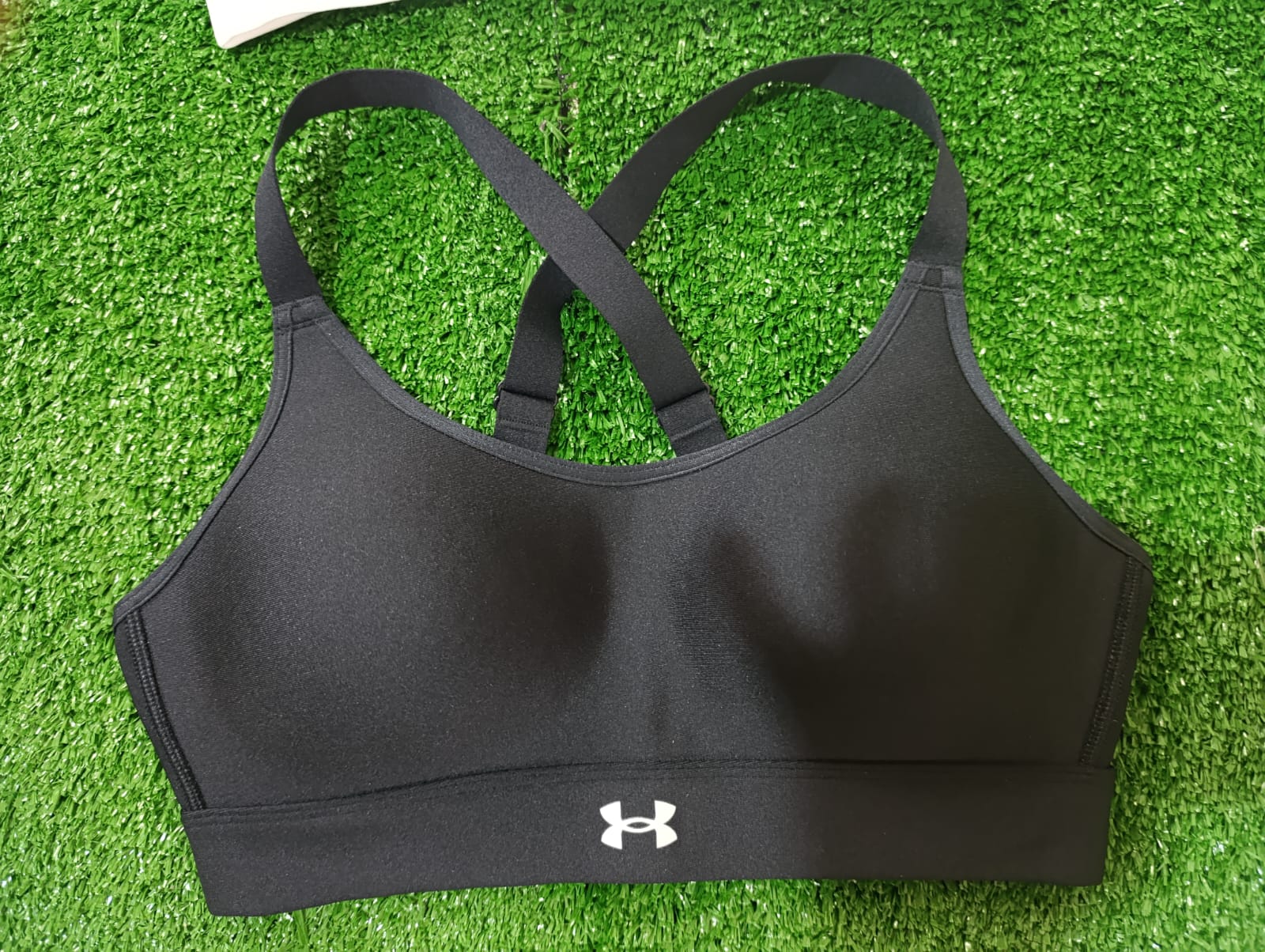 SUJETADOR DEPORTIVO UNDER ARMOUR CON COPA NEGRO